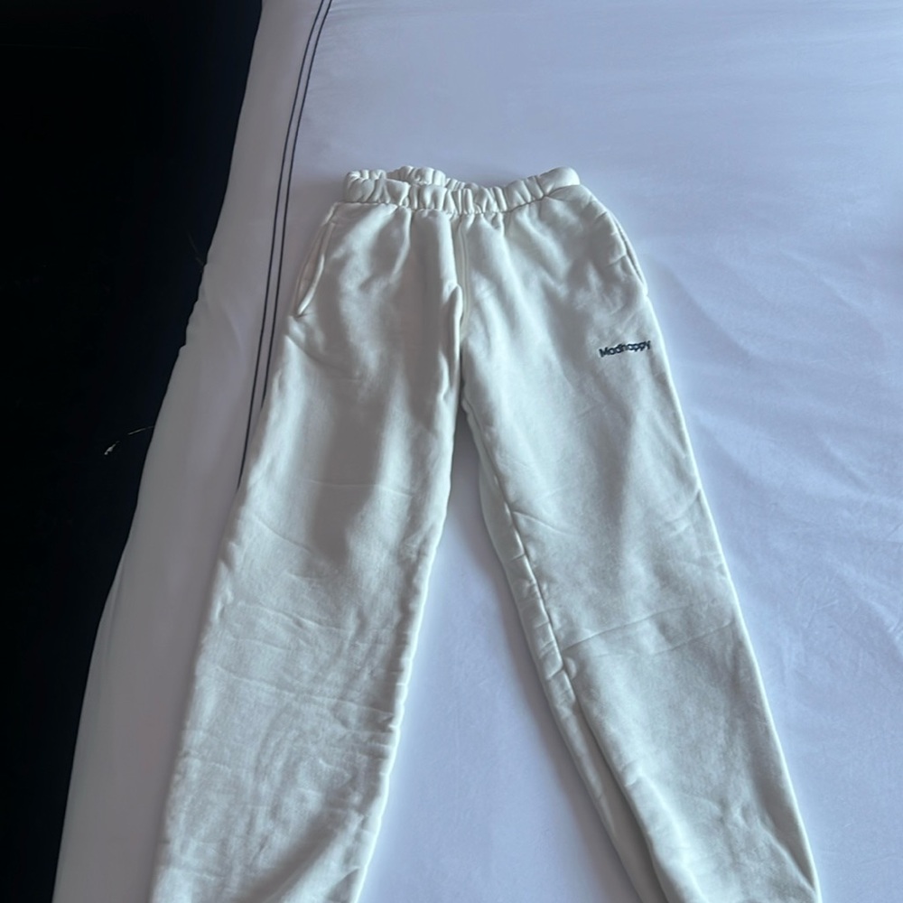 White/cream madhappy sweatpants with navy embroidery